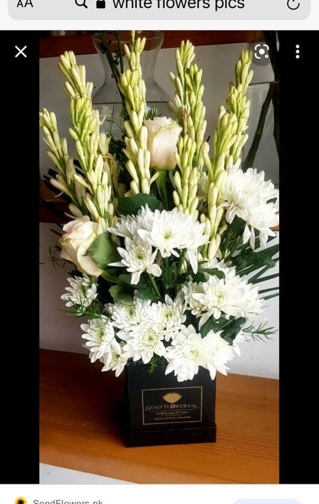White Flower Arrangement by Shah G Flowers